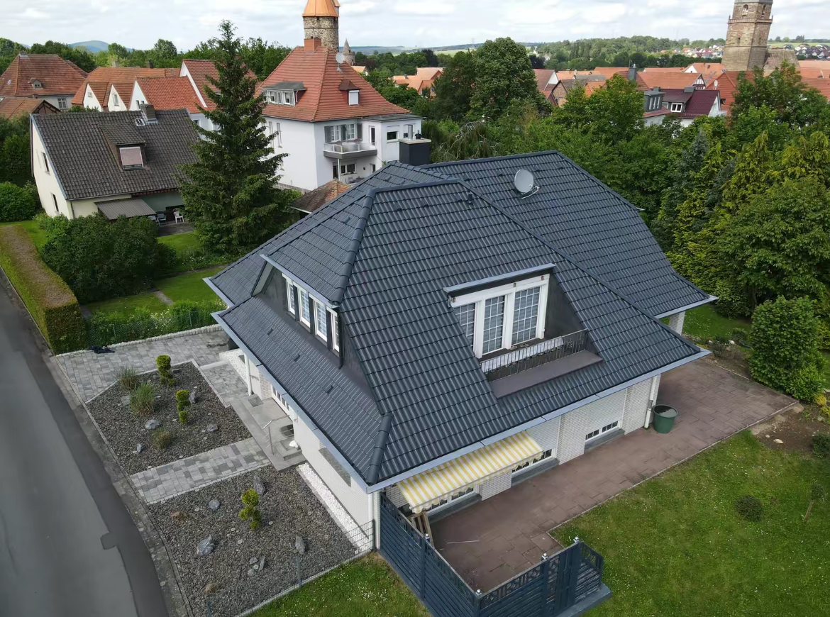 Dachreinigung und Dachbeschichtung Köln