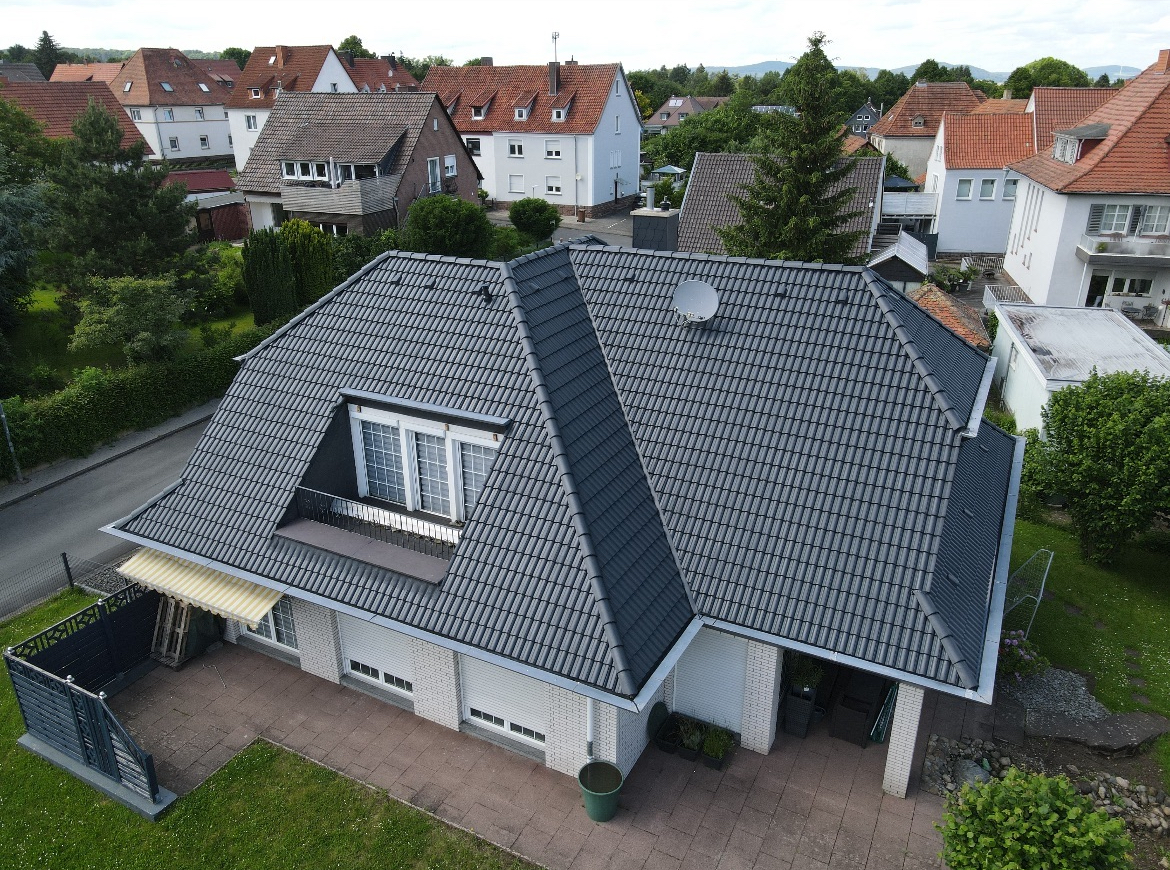 Dachreinigung und Dachbeschichtung Köln