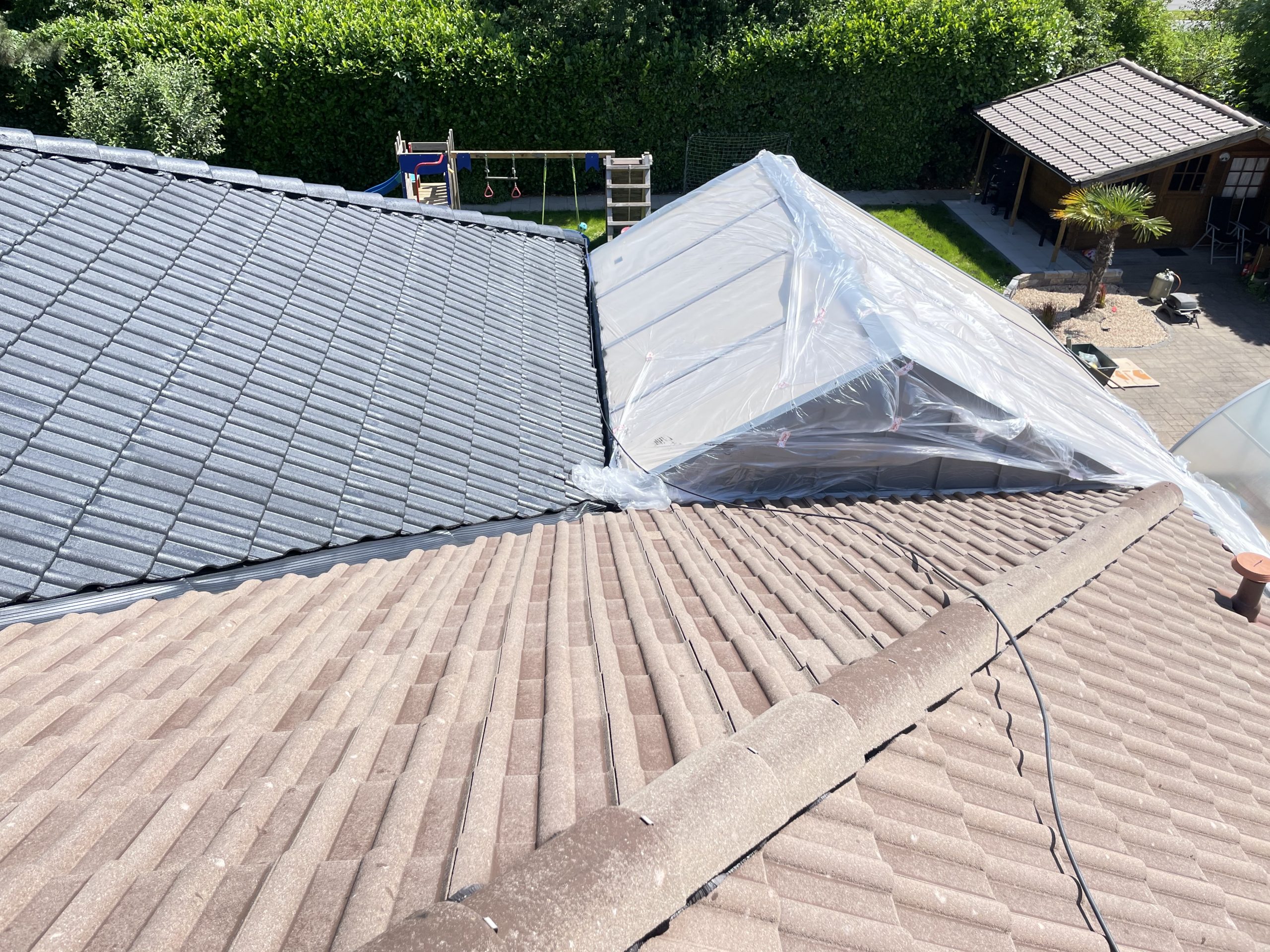 Dachreinigung und Dachbeschichtung Köln